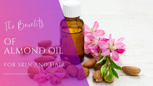 bright pink almond flowers surrounding an amber jar of sweet almond oil