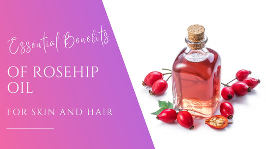bright red rosehips surrounding red rosehip oil in a vial