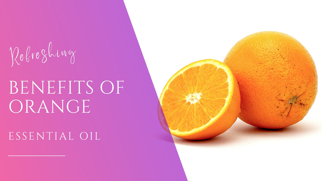 Orange halves on a white background to show the benefits of orange essential oils for skin and wellness