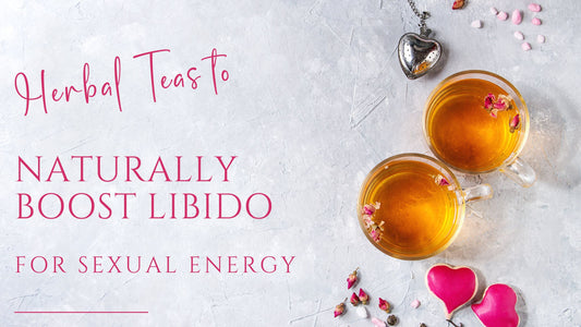 overhead shot of valentine's day herbal tea surrounded by red hearts