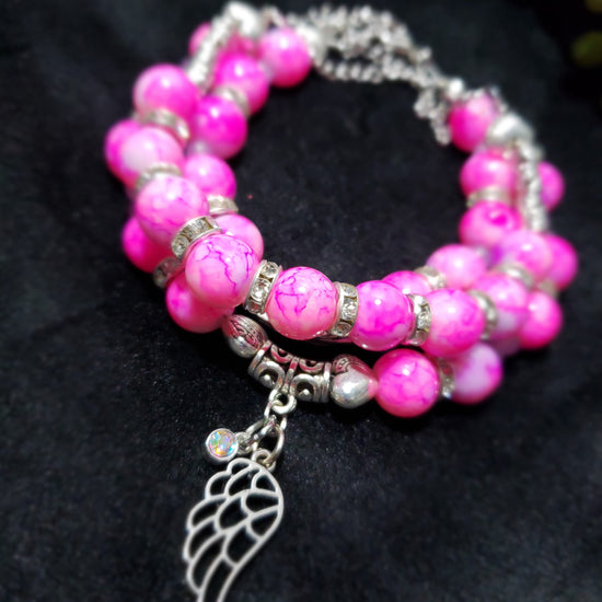Pink marble beaded bracelets with silver angel wing charm